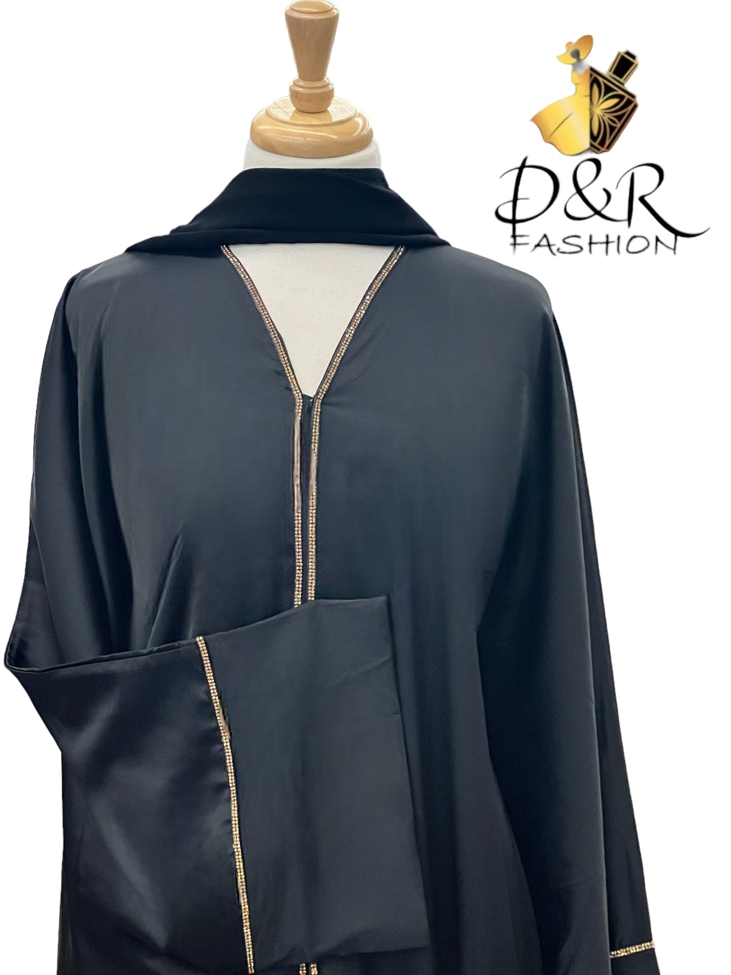 Discover our exquisite Open Abaya from Dubai with stunning golden ribbon