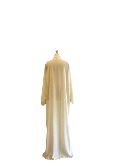 Discover our transparent off-white Dubai abaya, adorned with bead embroidery