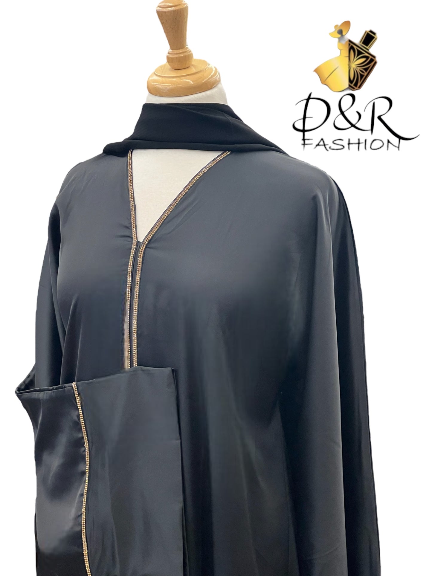 Discover our exquisite Open Abaya from Dubai with stunning golden ribbon