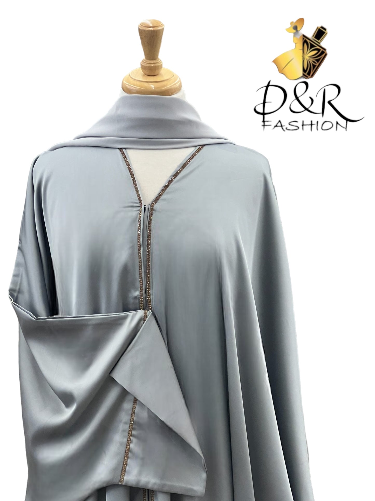 Discover our exquisite Open Abaya from Dubai with stunning golden ribbon